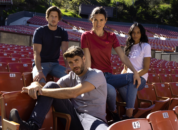 people sitting on stadium seats